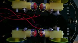 Motors with noise suppression capacitors